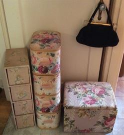 Wallpaper covered sets of drawers, fabric covered chest with hinged lid, black wool purse with lucite details