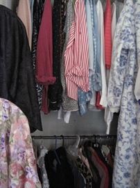 four closets full of beautiful ladies clothes which include fine brands and lots of Susan Graver items