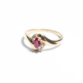 14K Yellow Gold Ruby and Diamond Ring: A 14K yellow gold, ruby and diamond ring.
