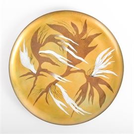 Mid-Century Miguel Pineda Mexico Decorative Enameled Plate: A mid-century enameled copper plate by Miquel Pineda. The decorative copper plate is designed with freeform organic shapes in toffee, black and faintly speckled white to a deep gold metallic background. The plate is signed to the verso Miguel Pineda Mexico with “mezzanine londres 104-6” with an improvised hanger.