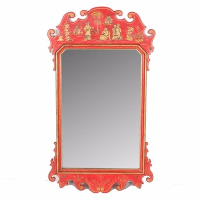 Hand-Painted Asian Inspired Mirror: An Asian inspired wood wall mirror. This red mirror features scrolled edges to the top and the bottom with hand-painted gold tone accents to the wooden frame. There is an attached wire to the verso.