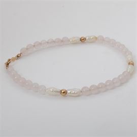 14K Yellow Gold Pearl and Rose Quartz Bead Bracelet: A 14K yellow gold pearl and rose quartz bead bracelet.