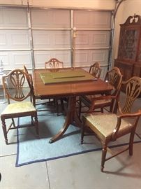 Vintage dining room table with one arm chair and 5 chairs 