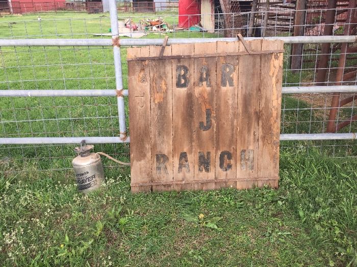 cool, old ranch sign with original hardware and metal sprayer