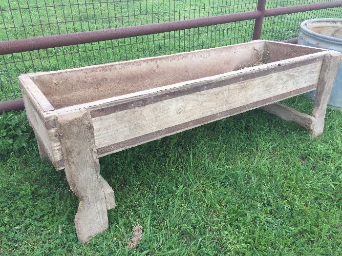 Very old water trough. This would make a great decoration piece in a farmhouse chic home. This is not a reproduction. 