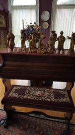 Piano and needlepoint bench