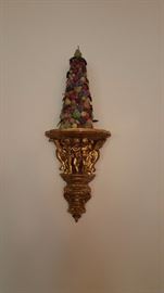 Sconce featuring cherubs