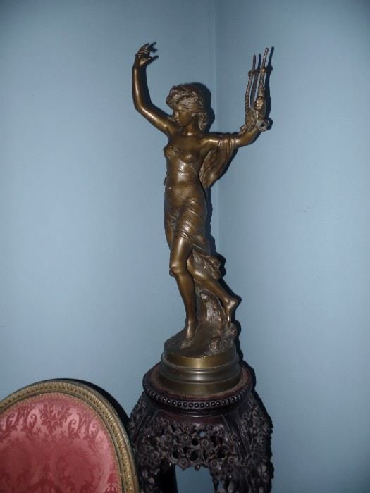Bronze, French, late 19th Century. Woman with lyre – 30 inches. Signed, Math Moreau and below the signature “Hors Concours”. 