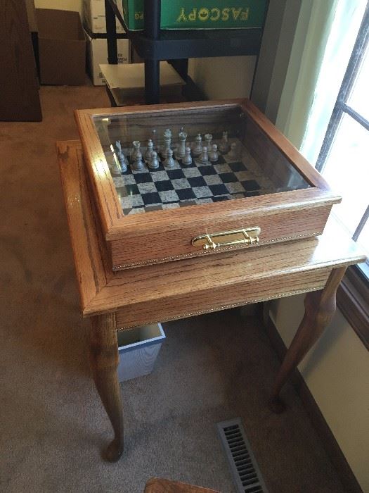 oak chess table with glass top cover and chess pieces