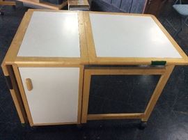 Drop leaf rolling table