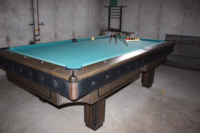 Cool vintage pool table with balls, and cues