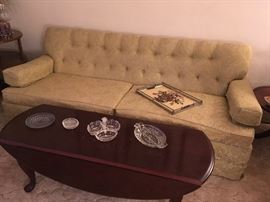 Mid century modern sofa and Queen Anne coffee table