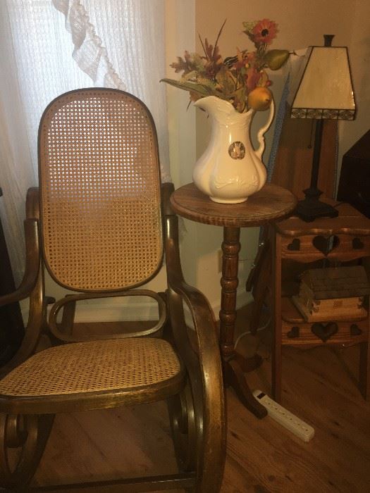Oak rocker with cane back and bottom. oak plant stand and oak primitive step ladder that folds to an iron board