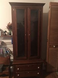 gun cabinet with two pull out drawers on bottom