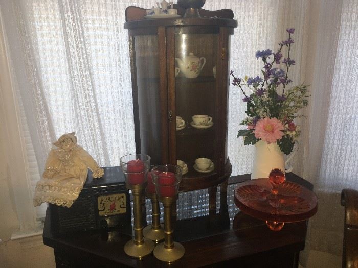 small miniature display cabinet with clock, candle sticks, glass, dolls , and other great items