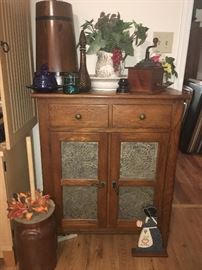 pie safe with two pull out drawer on top and coffee grinder and other primitive items along with churn 