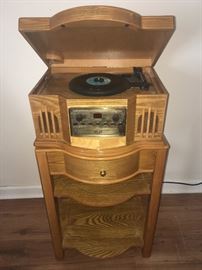 Philco stand with record player, cd, and cassette player. DOES work and in good condition~