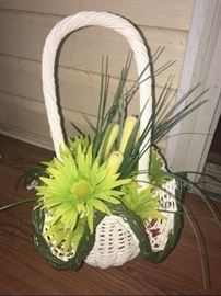 wicker basket with flower arrangement