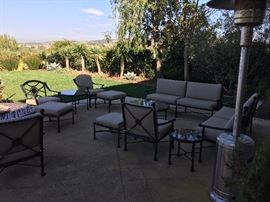 tons of patio sets and umbrellas 