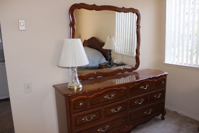 Six drawer chest and mirror.