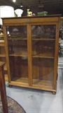 tiger oak curio cabinet with key
