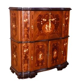 Wooden Buffet With a Mirror Mosaic: A wooden buffet with a mirror mosaic. This piece features beveled edges, lacquering to the surface with a glossy finish, and cabinet doors. There are no visible makers markings or labels on the buffet.