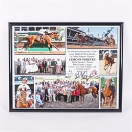 Mark Guidry and Robby Albarado Signed Kentucky Oaks Poster: A Kentucky Oaks poster, signed by jockeys Mark Guidry and Robby Albarado. The poster has a collage of images from the race, with text commemorating Lemons Forever and Guidry’s win. Guidry has signed at the bottom of the text block. Albarado, who jockeyed Ermine and came in second, has signed in the upper right, on a shot of the last stretch. The piece is presented in a black frame.