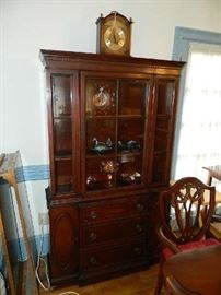 The matching china cabinet with a wonderful chiming clock on top - works and keeps time perfectly