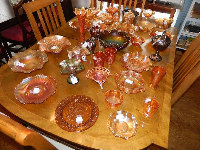 A table Full Of Carnival Glass
