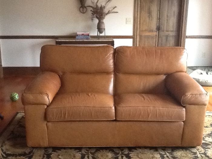 Ethan Allen love seat British tan leather 6 feet long by 37"deep and 37" high
