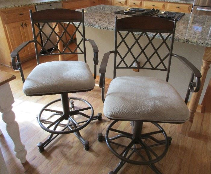 kitchen stools swivel seat is 26" high, floor to top of back is 41" high