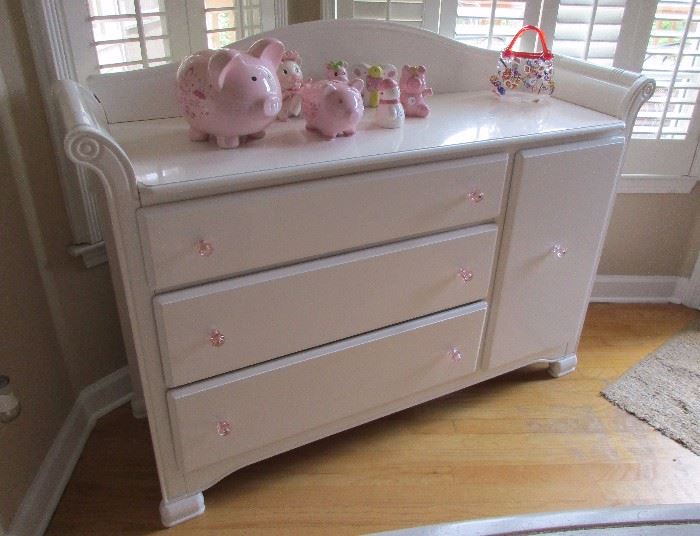 white dresser with pigs