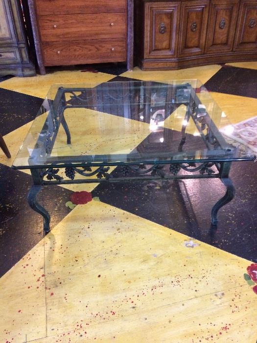 Glass and wrought iron coffee table