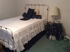 Full bed - vintage metal bed frame with matching pillows & side table with matching tablecloth.   Nice crystal lamp. 