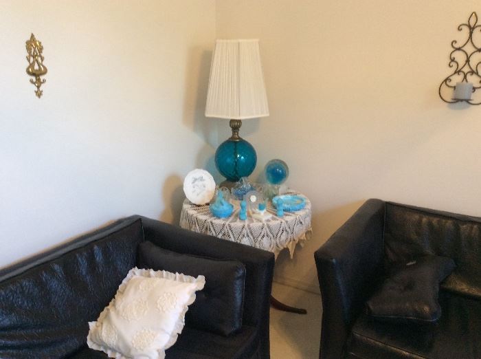 Wall sconces, corner round table & matching set of lamps with sofa & chair. 