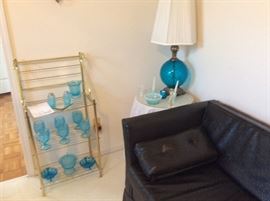 Additional side table and display shelf with more collectibles. 