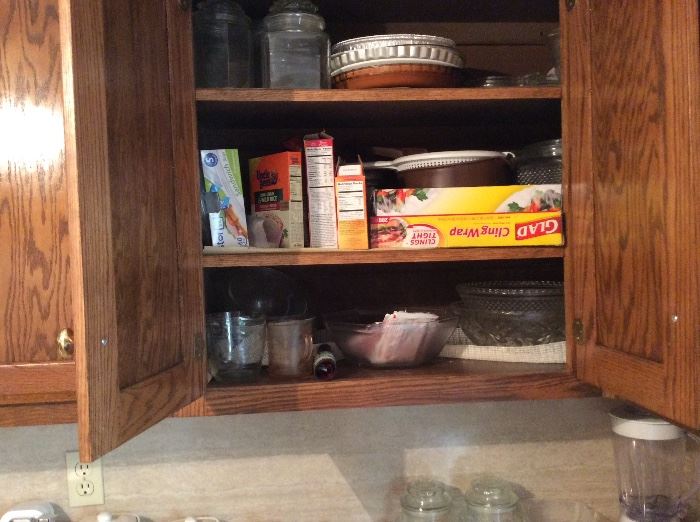 Cabinets are full of all kinds of items 