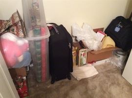 Christmas wrapping paper, other items, suitcases