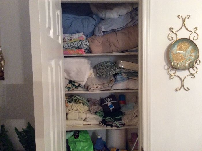 Closet full of sheets, pillow cases, blankets 