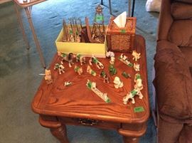 End table with all kinds of dog figurines