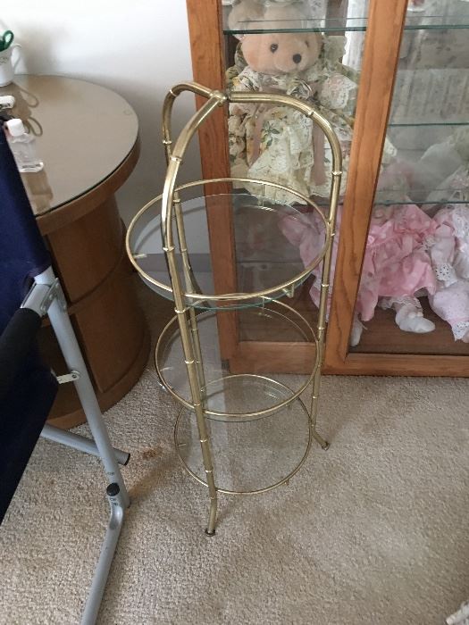 Small gold toned and glass stand