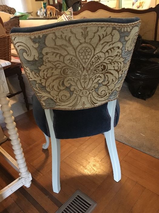 Pair of French Chairs with blue velvet seats and backs, and decorative floral fabric on outside back