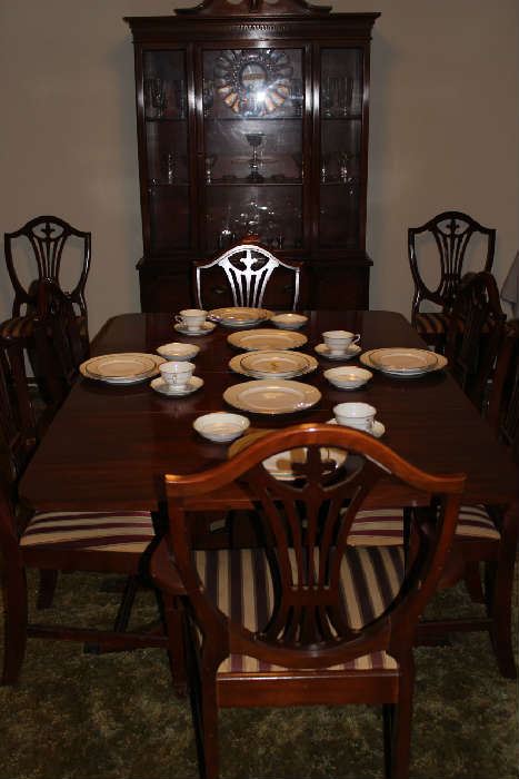 Elegant cherry wood dining room set with the Bavaria gold trim China. Buffet, table with multiple leaves, 8 chairs, allying rear shape.