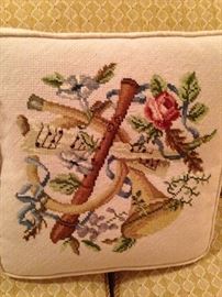 One of two companion needlepoint pillows - French horn and flute