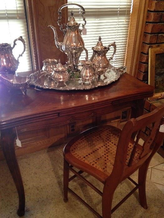 Baroque coffee service by Wallace; drawleaf table; antique cane chair