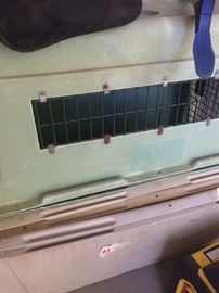 Many dog carriers and cages are available.