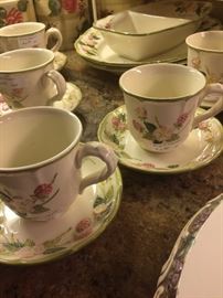 Cups and saucers of the Poppy Trail by Metlox (California) sculptured berry pottery