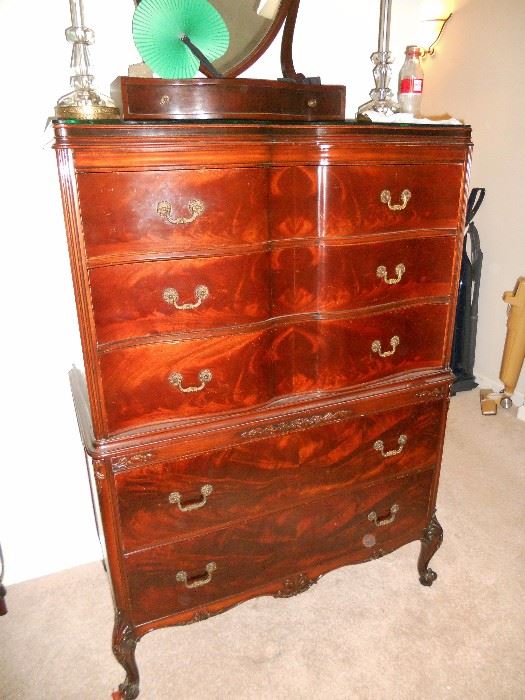 Mahogany curved front chest with five drawers