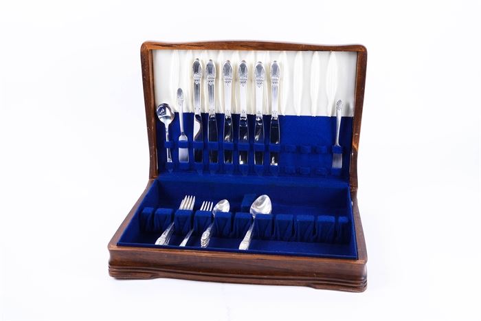 Vintage Rogers 1847 "First Love" Silver Plate Flatware Set with Tarnish Resistant Case: A vintage Rogers 1847 First Love silver plate flatware set with tarnish resistant case. Included are five forks, five teaspoons, five large spoons, six knives, two butter forks, and a spoon. They are held in a tarnish resistant case lined with blue felt.