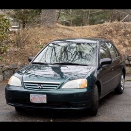 2002 Honda Civic LX Sedan: A green 2002 Honda Civic LX 4-door mid-size sedan with a 1.7 liters engine. This automatic drive vehicle has power windows, locks and mirrors, AM/FM stereo and air conditioning and heat. The interior with tan fabric. This vehicle has a VIN of 2HGES16542H595699 and 56,603 miles.